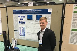 Image of Logan with his presentation