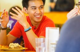 Student eating at the cafeteria